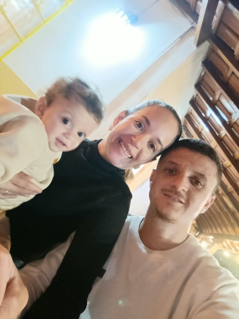 Família reunida com o pequeno Davi